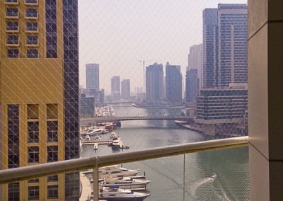 Safety netting barrier along large balcony – Dubai Marina.